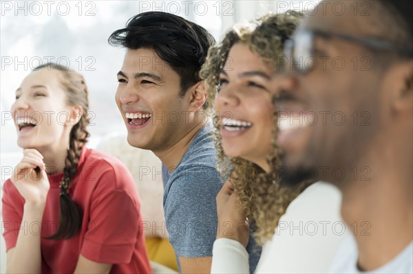 Group of friends laughing together