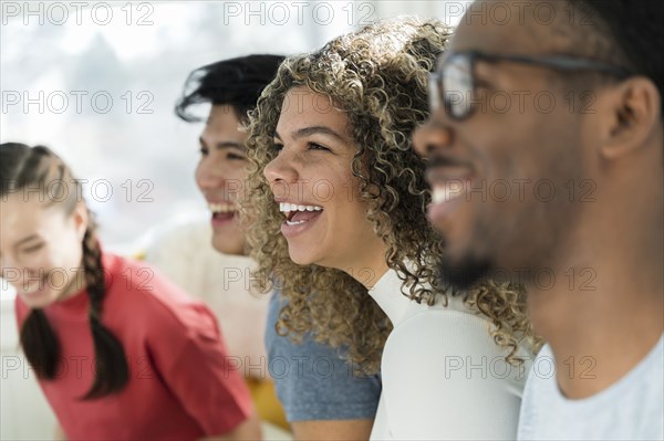Group of friends laughing together