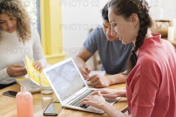 Coworkers working together in office