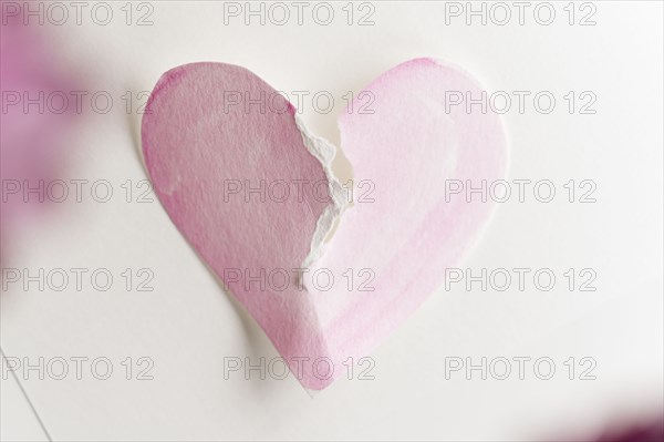 Paper heart ripped in half