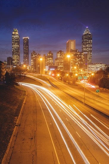 USA, Georgia,  AtlantaTraffic light trails in city at night