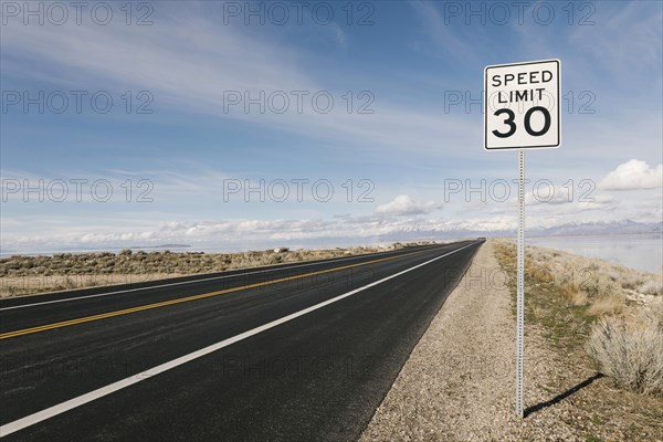 USA, Utah, Salt Lake City, Empty road with speed limit sign