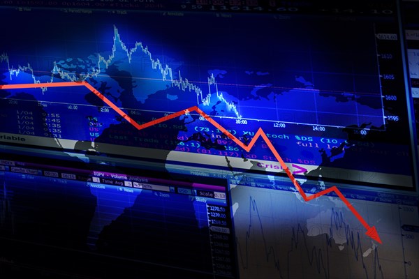 Stock market data and graph moving down