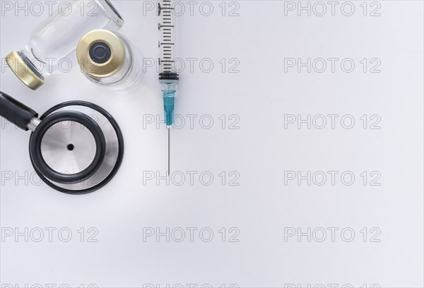 Studio shot of stethoscope, vials and syringe