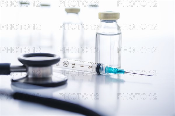 Studio shot of stethoscope, vials and syringe