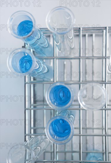 Overhead view of test tubes with blue liquid