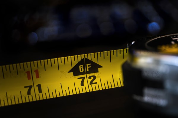 Close-up of tape measure showing six feet