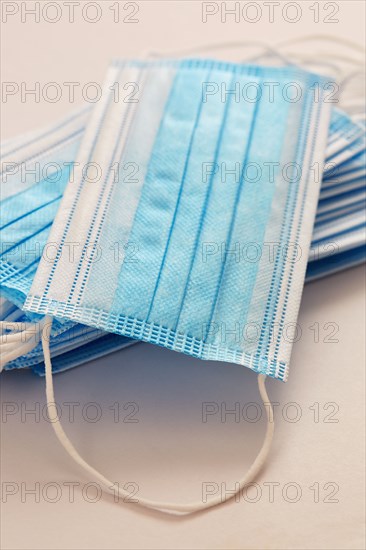 Studio shot of stack of surgical masks