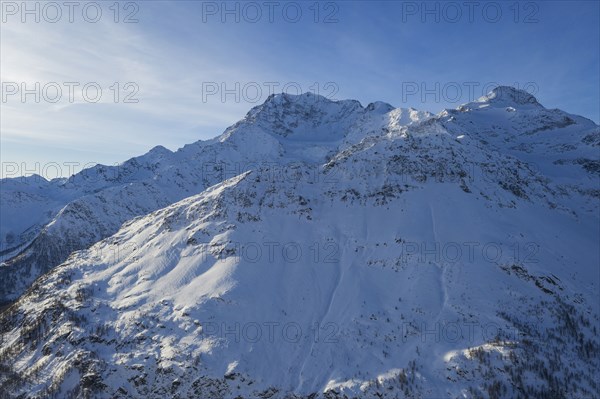 Switzerland, Canton Wallis, Simplon pass, Mountains on sunny day in winter