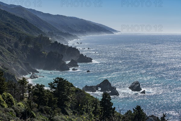 USA, California, Big Sur, Seascape with cliffs and rock formations on sunny day