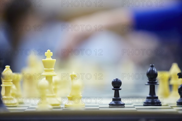 Close up of chess board with chess pawns