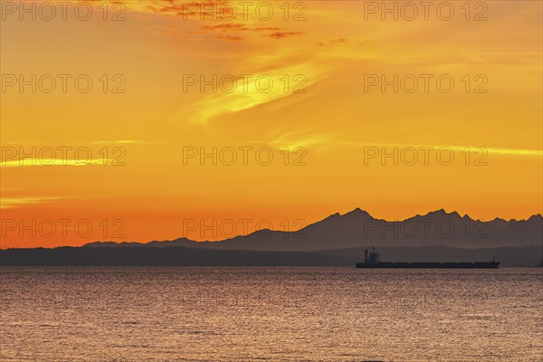 USA, Washington, Seattle, Sunset over seashore