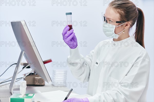 Female technician working in laboratory