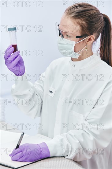 Female technician working in laboratory