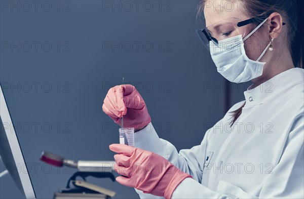 Female technician working in laboratory