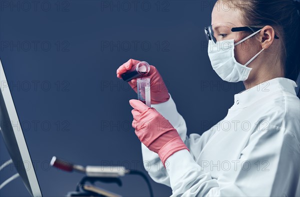 Female technician working in laboratory