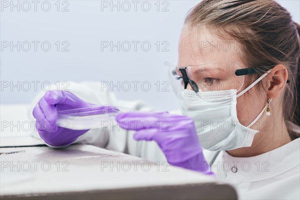Female technician working in laboratory