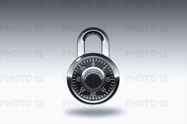 Padlock on gray background