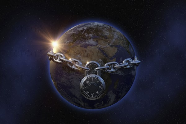 Padlock on chain surrounding globe in space