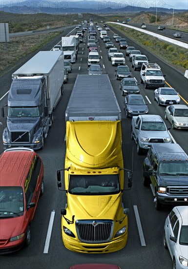 USA, Michigan, Trucks in traffic jam on highway