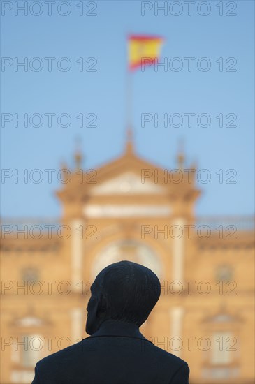 Spain, Seville, Statue of Anibal Gonzales at Plaza de Espana