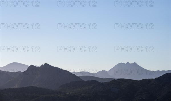 Spain, Ronda, Sierra de Grazalema under blue sky