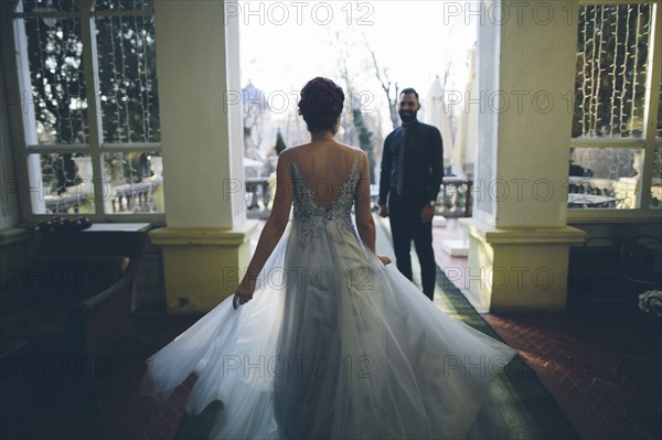 Newlywed couple at terrace