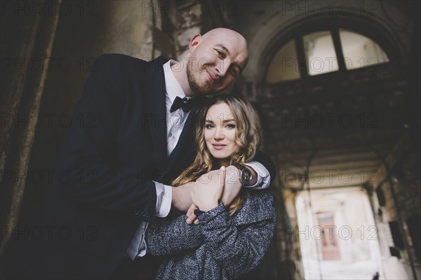 Portrait of smiling newlywed couple