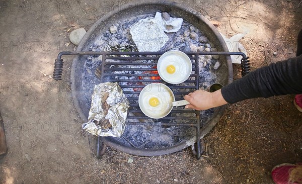 Preparing breakfast at camping