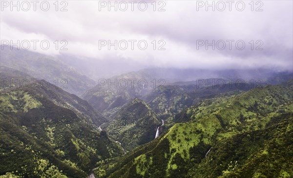 USA, Hawaii, Kauai, Na Pali, Waterfall in mountains