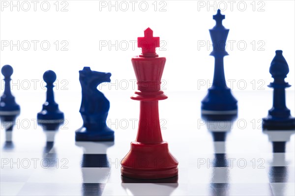 Studio shot of red and blue chess pawns symbolizing US Democratic and Republican parties