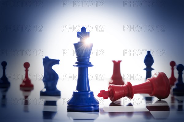 Studio shot of red and blue chess pawns symbolizing US Democratic and Republican parties