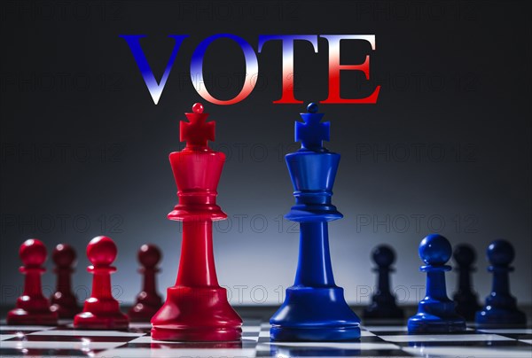 Studio shot of red and blue chess pawns symbolizing US Democratic and Republican parties