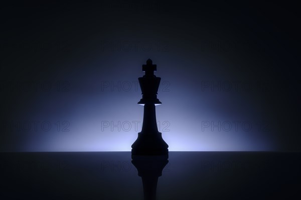 Studio shot of blue chess king