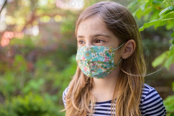 Girl (-6-7) wearing face mask