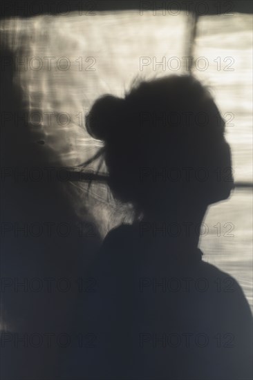 Shadow of woman in morning light