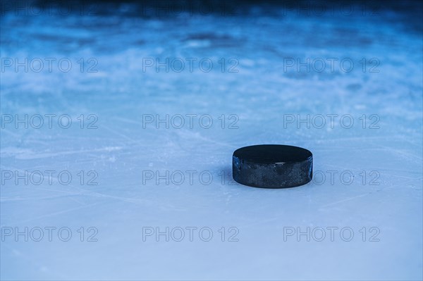 Hockey puck on ice