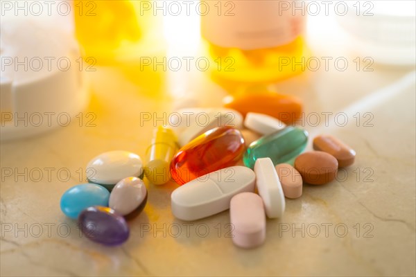 Pills and capsules on marble
