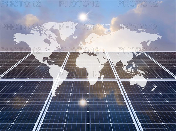 World map over solar panel,,