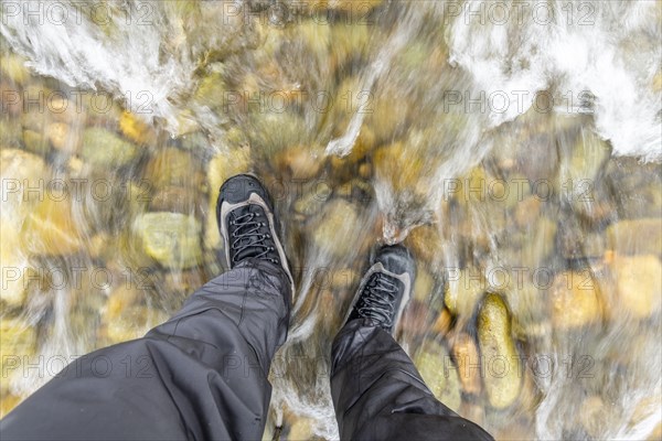 Man standing in river