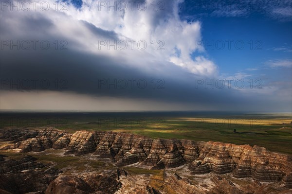 USA, South Dakota, Badlands National Park, Badlands with clearing storm clouds