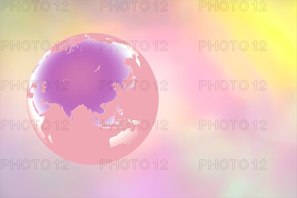 Globe showing Middle East and Asia on pastel background