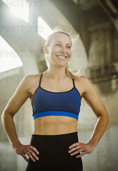 USA, California, Los Angeles, Portrait of woman wearing sports bra