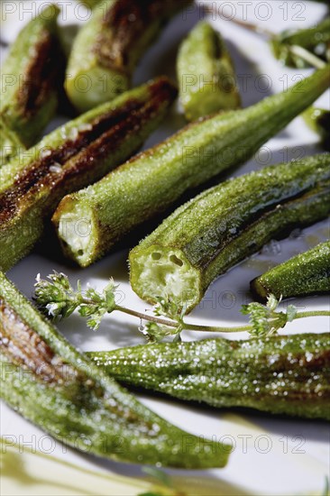 Close up of roasted okra pieces
