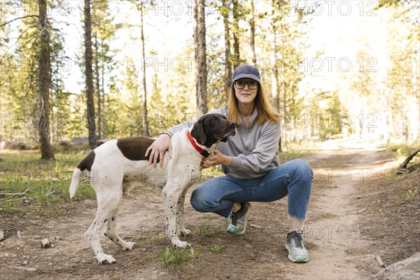 Woman with her dog in Uinta-Wasatch-Cache National Forest