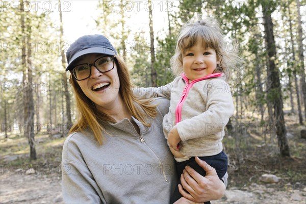 Portrait of happy mother with little daughter