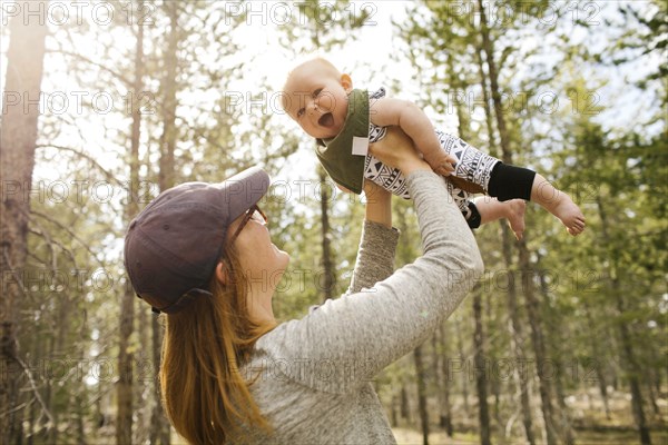 Woman holding baby son