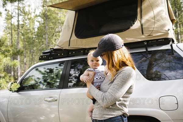 Woman holding baby son