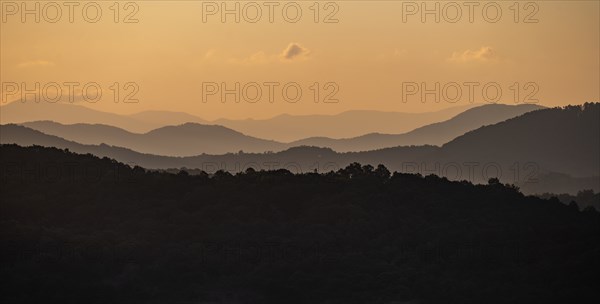 USA, Georgia, Orange sky above Blue Ridge Mountains at sunrise