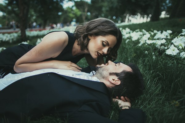 Ukraine, Couple embracing in garden